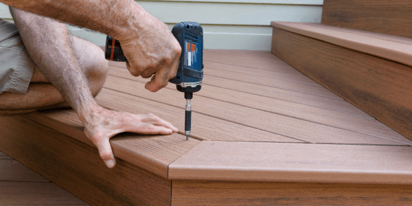 Worker Installing the Best Decking Material