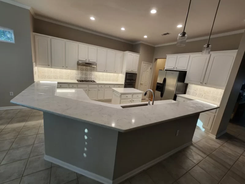 remodeled kitchen with uniquely shaped island